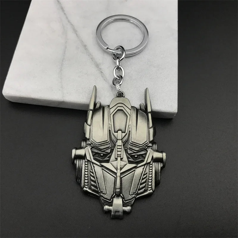 Brelok Transformers – logo Megatrona, srebrne