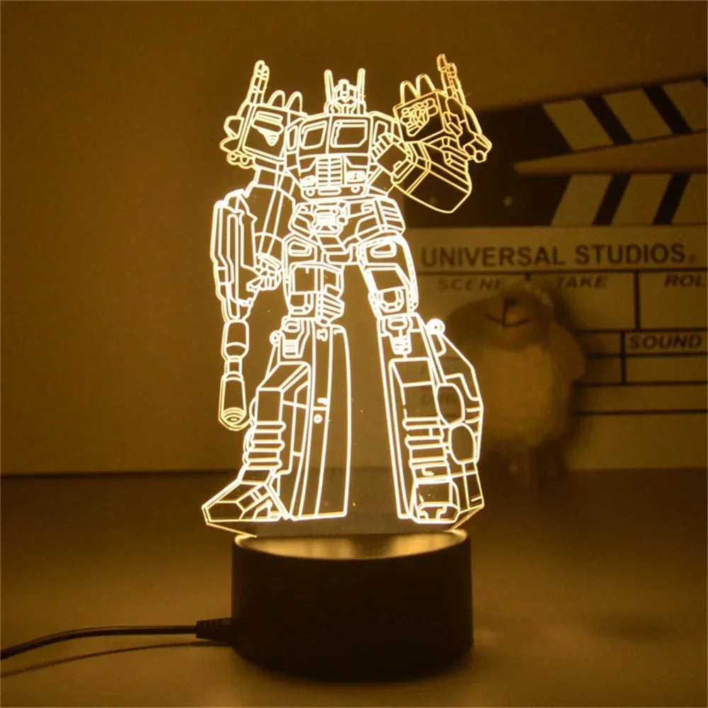 Veilleuse LED robot lumineux, silhouette stylisée posée sur une base noire, lumière jaune – Transformers.