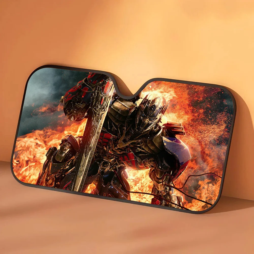 Osłona przeciwsłoneczna Transformers Optimus Prime Pomarańczowe płomienie — Samochodowa ochrona przeciwsłoneczna, uniesiony miecz