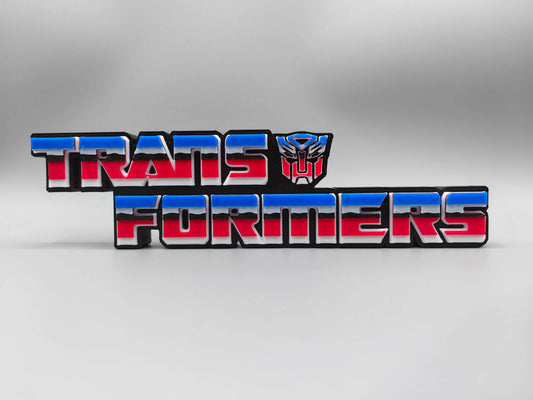 Tabliczka Transformers z czerwono-niebieskim logo Autobotów — Trójwymiarowa dekoracja na biurko