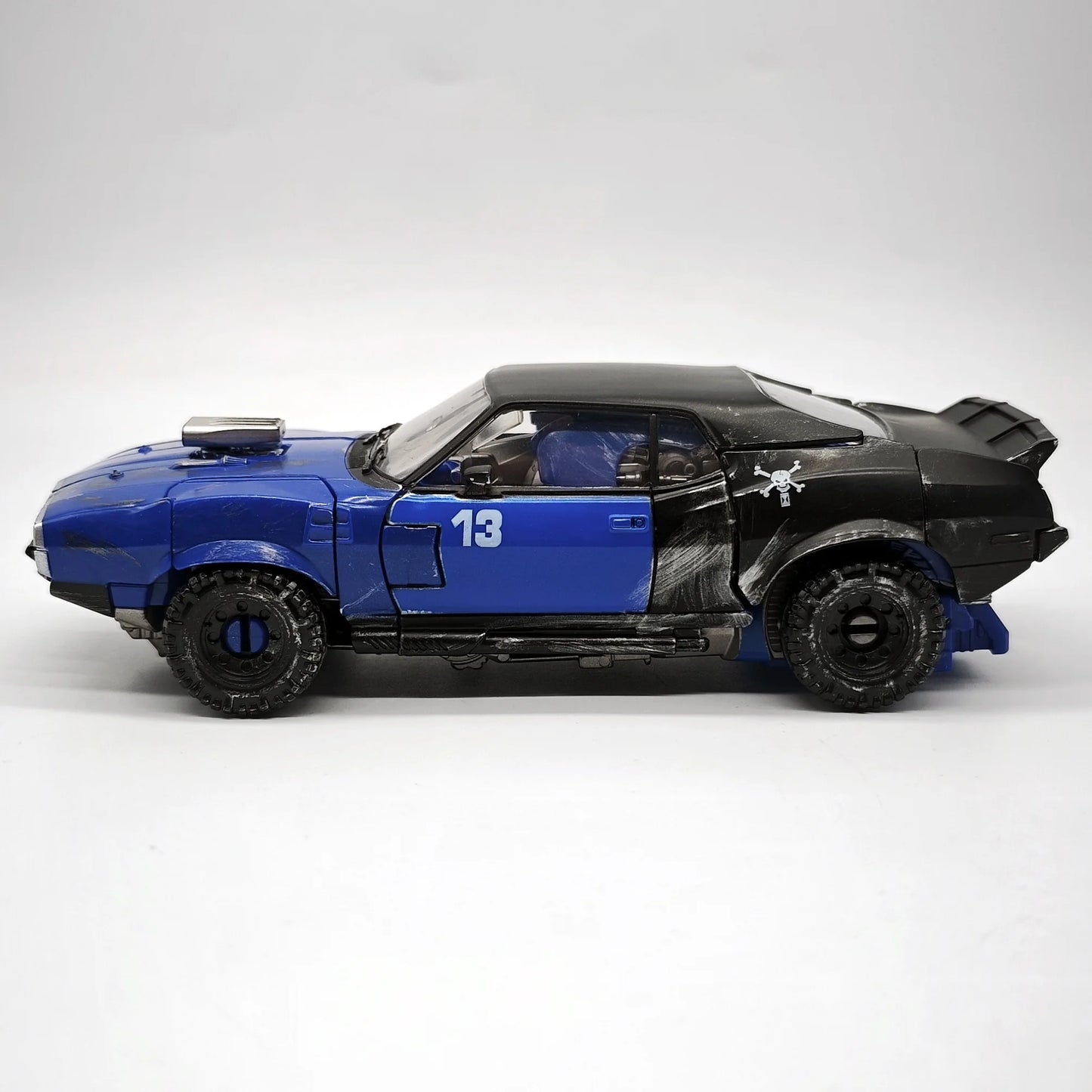 Figurka Transformers Dropkick czerwona TW1033B — przegubowy samochód Decepticon
