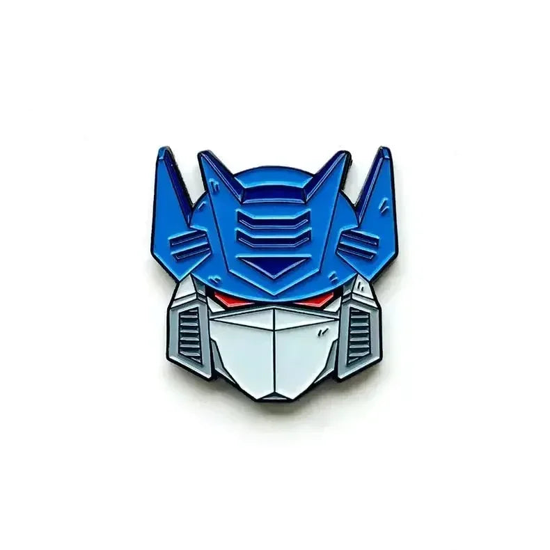 Niebieska przypinka Transformers Autobot — głowa w hełmie do plecaka