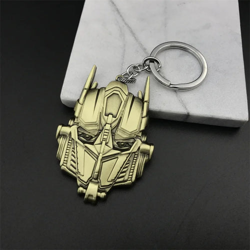 Brelok Transformers – logo Megatrona, złote