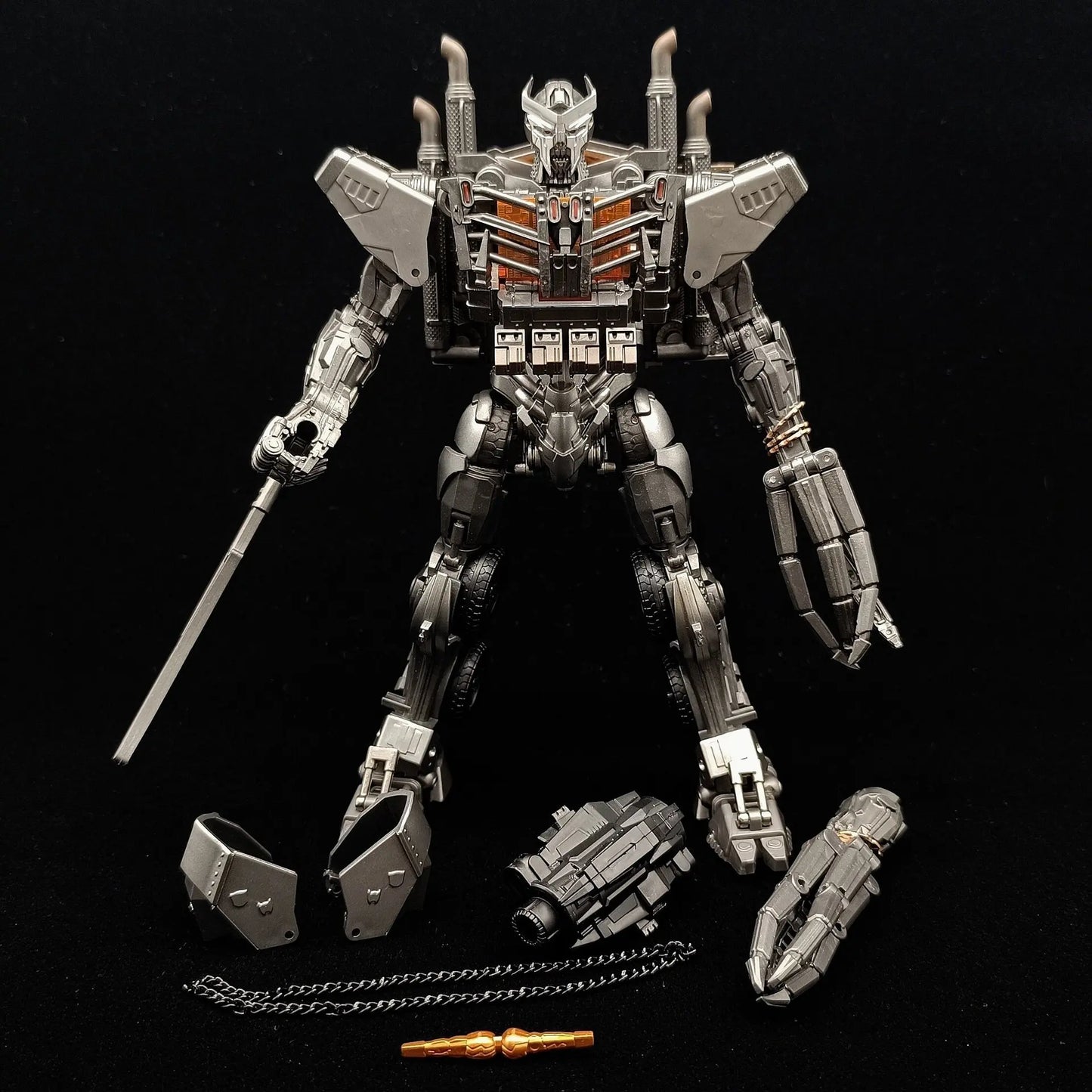 Figurka Transformers Scourge z mieczem w świetle TW1031 — Chromowana walka w trybie naczepy