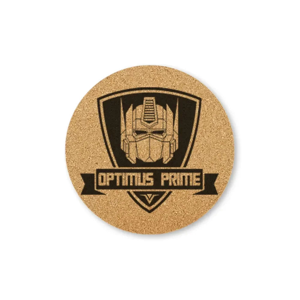 Dessous de verre rond en liège avec visage d’Optimus Prime noir et logo, style geek – Transformers.