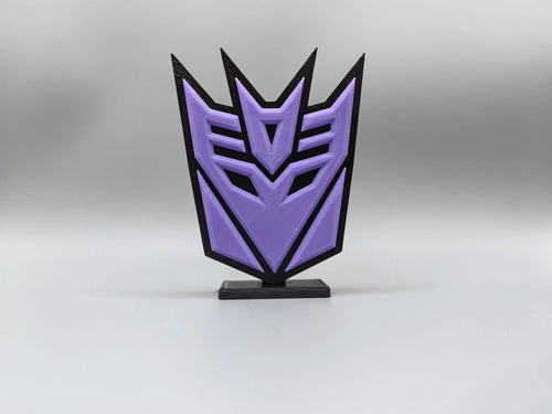 Tabliczka Transformers Decepticon w fioletowym kolorze — Ozdoba na biurko z emblematem
