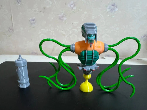 Popiersie Transformers — pomarańczowy potwór z mackami — kolekcjonerskie stworzenie o pięciu twarzach