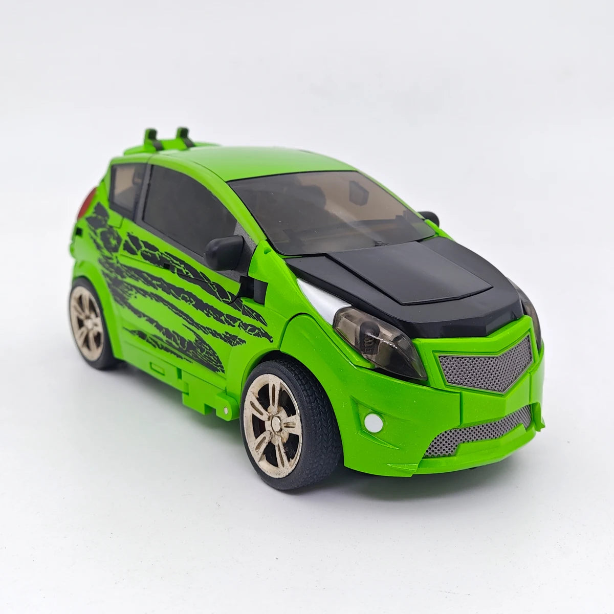 Figurki Transformers Skids i Mudflap — zielony duet bliźniaków Dumb Unique Toys