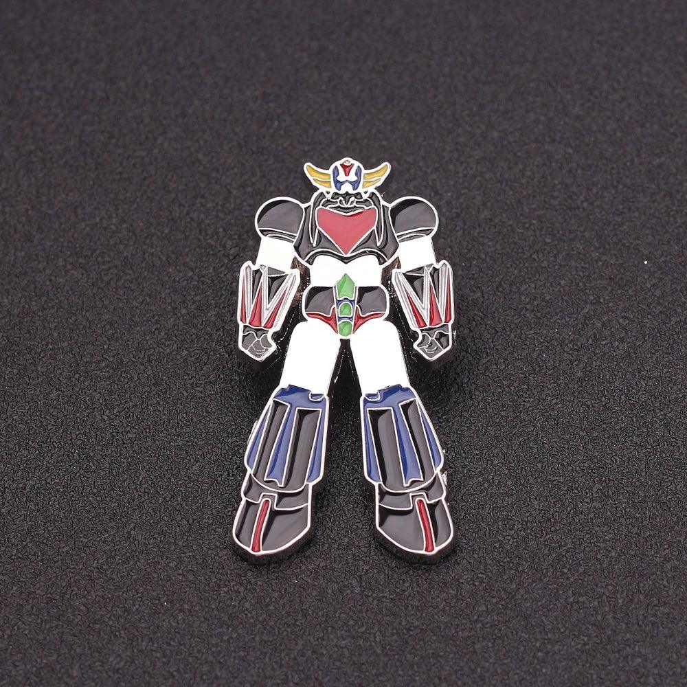 Pin émaillé robot géant coloré en métal, personnage debout sur fond noir – Transformers.