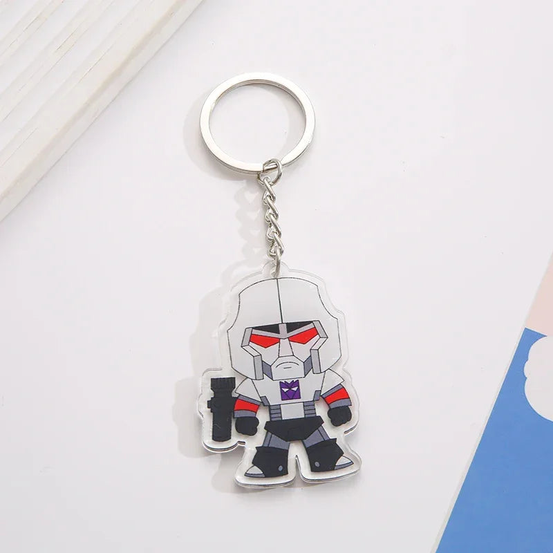 Porte-clés Transformers Megatron en acrylique, personnage robot gris stylisé sur fond blanc – Transformers.