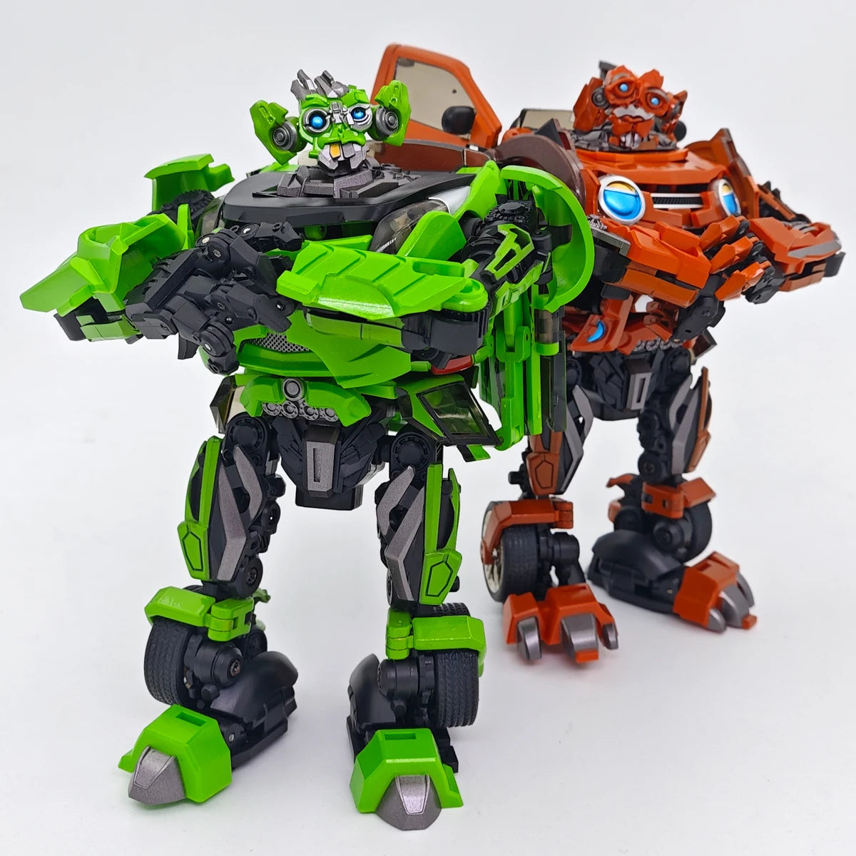Figurki Transformers Skids i Mudflap — zielony duet bliźniaków Dumb Unique Toys