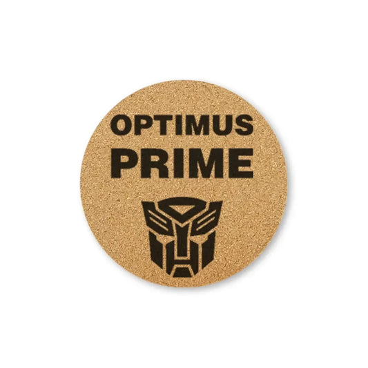 Dessous de verre rond en liège, texte Optimus Prime et logo noir stylisé – Transformers.