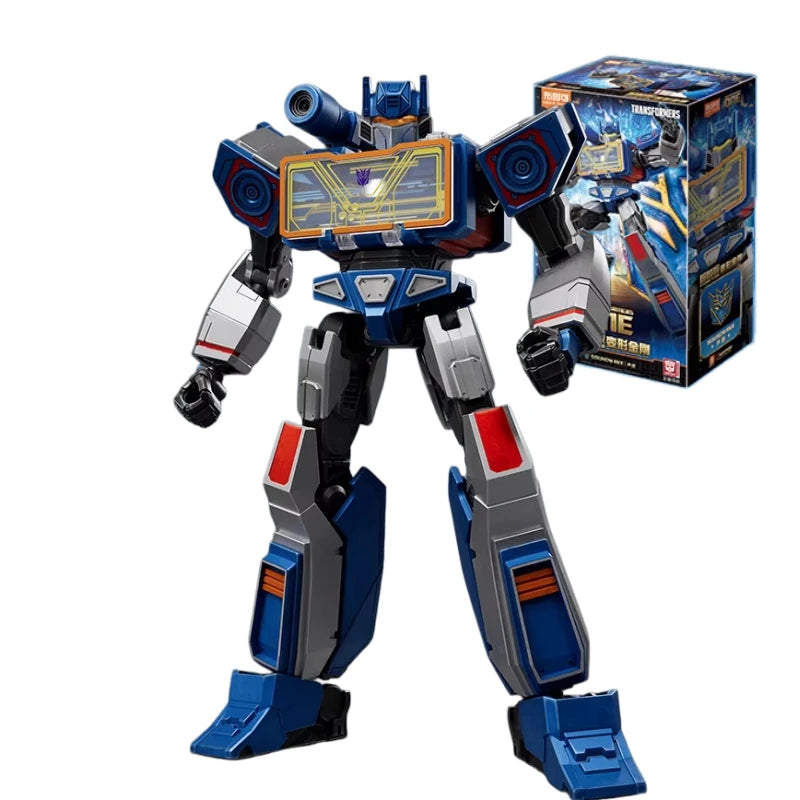 Figurka Transformers Soundwave Origin ONE Blitzwing — Łupkowoniebieski szpieg z kasetą z cegiełek